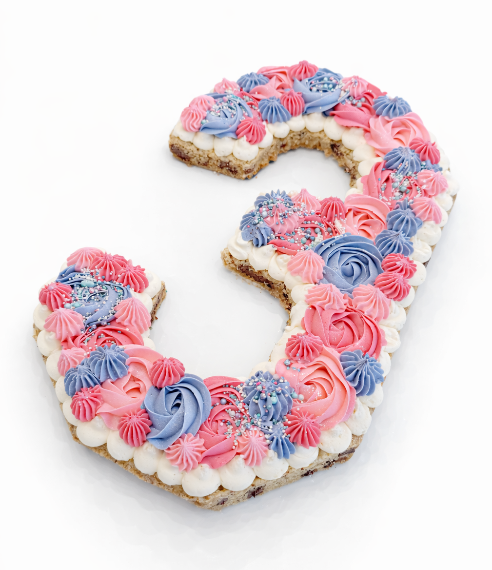 Custom 3 shaped cookie cake in pink and white