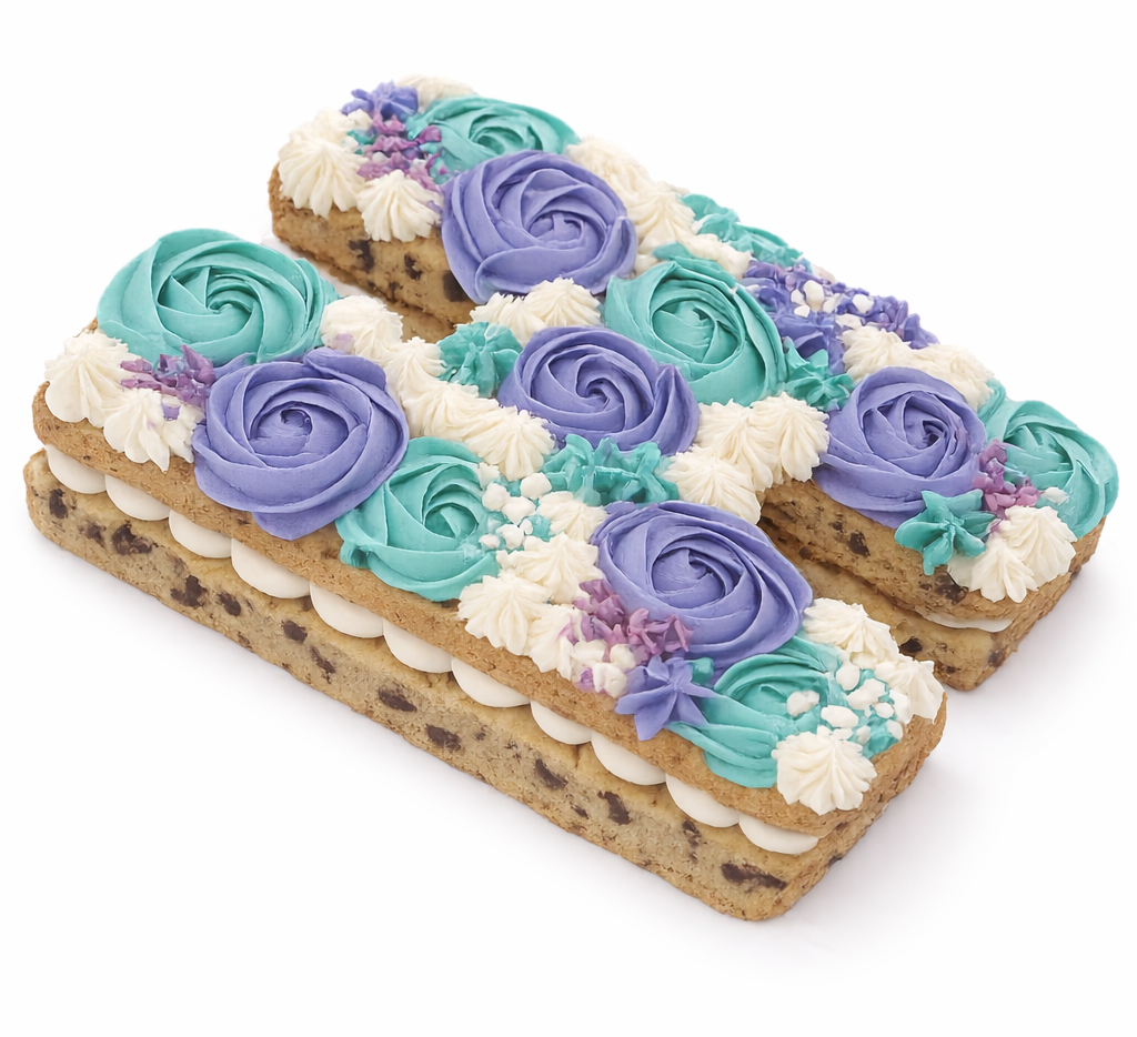 Custom H shaped cookie cake in teal, purple and white