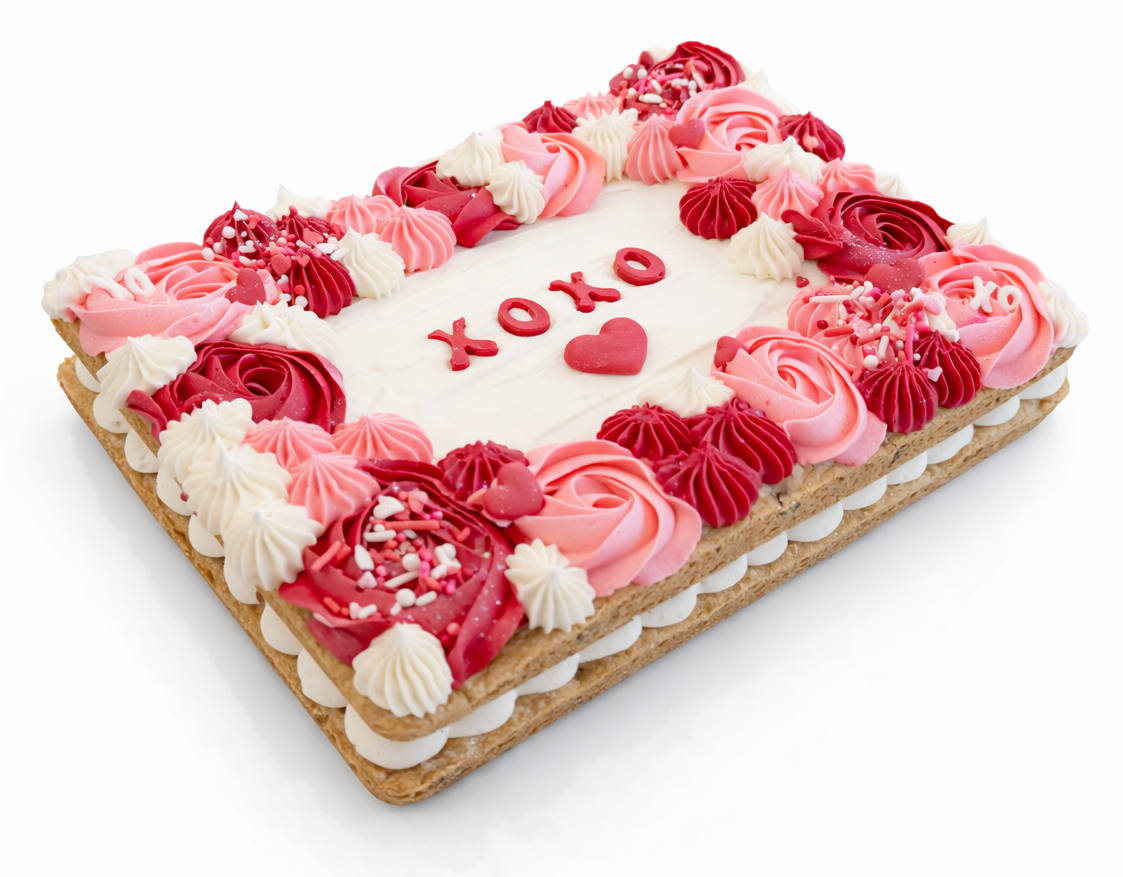Valentine themed cookie cake in red, pink and white